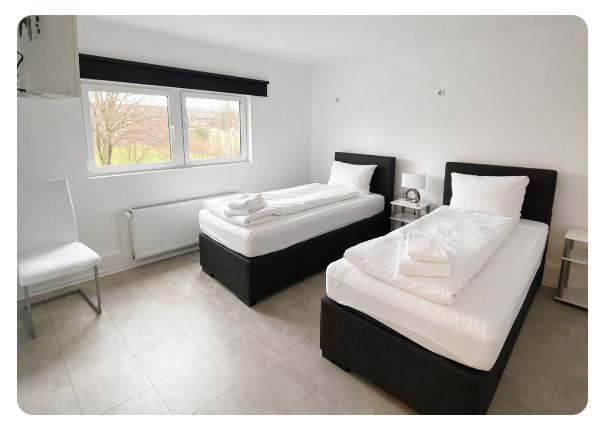 Zimmer mit zwei Einzelbetten — ideal für Monteure